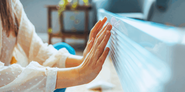 Journal | Action Rehab Hand Therapy Clinic - Shoulder, Elbow, Wrist and Hand Physiotherapists Cold hands and stiff joints holding up to heater for warmth